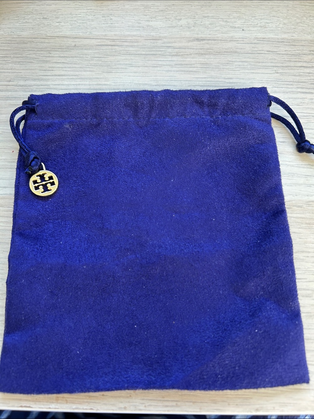 Tory Burch Cobalt Velvet Drawstring Pouch with Gold Logo Charm
